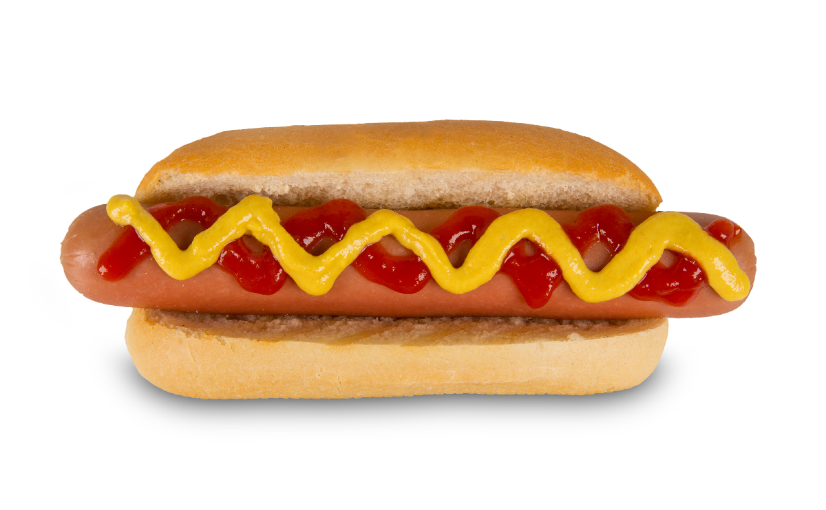 Photo of a hot dog in a bun with mustard and tomato sauce zig zagging across it